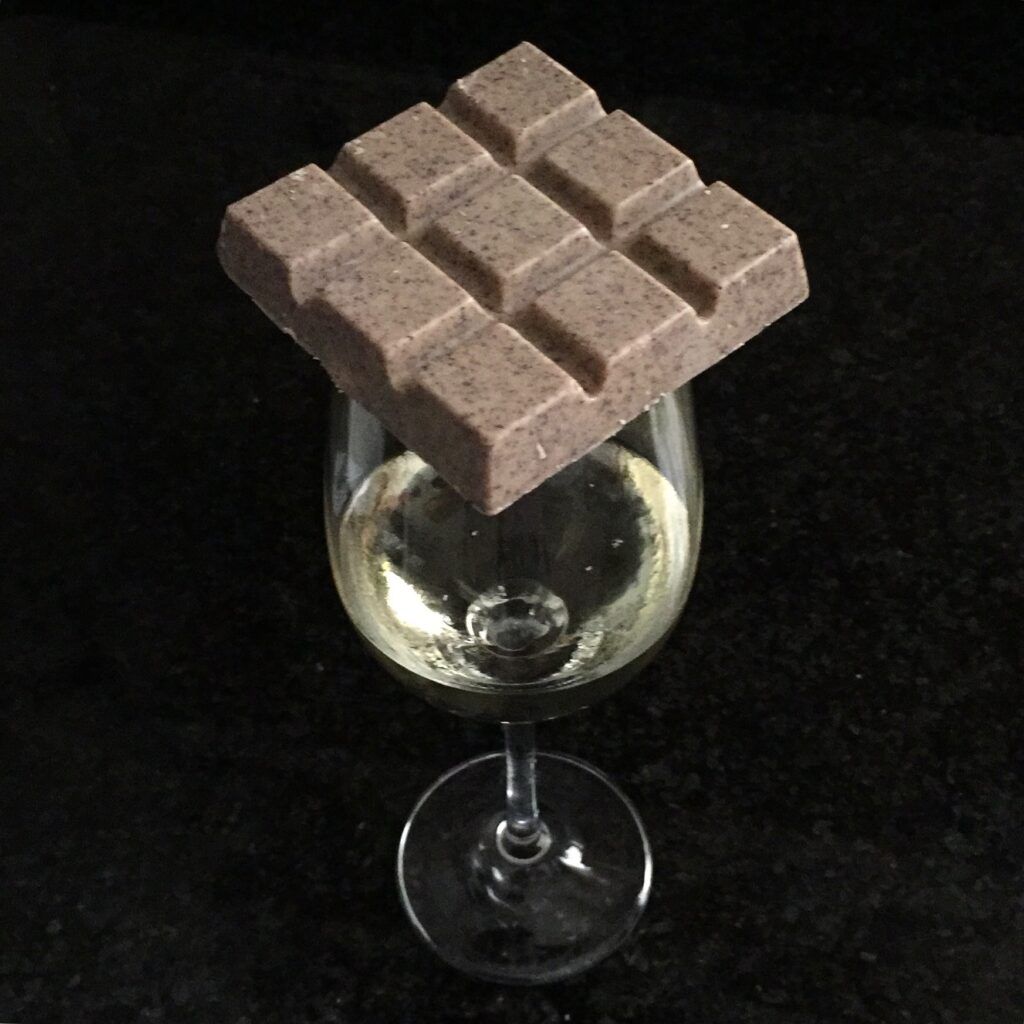 Chocolate and white wine, both used at the Workshop Chocolate and Wine.